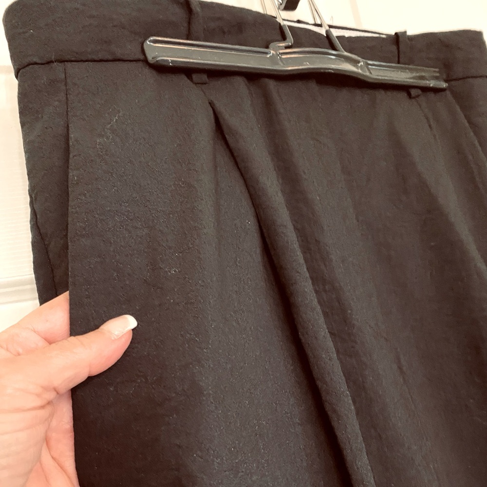 Mango suit pants with 2 pockets and front pleat.